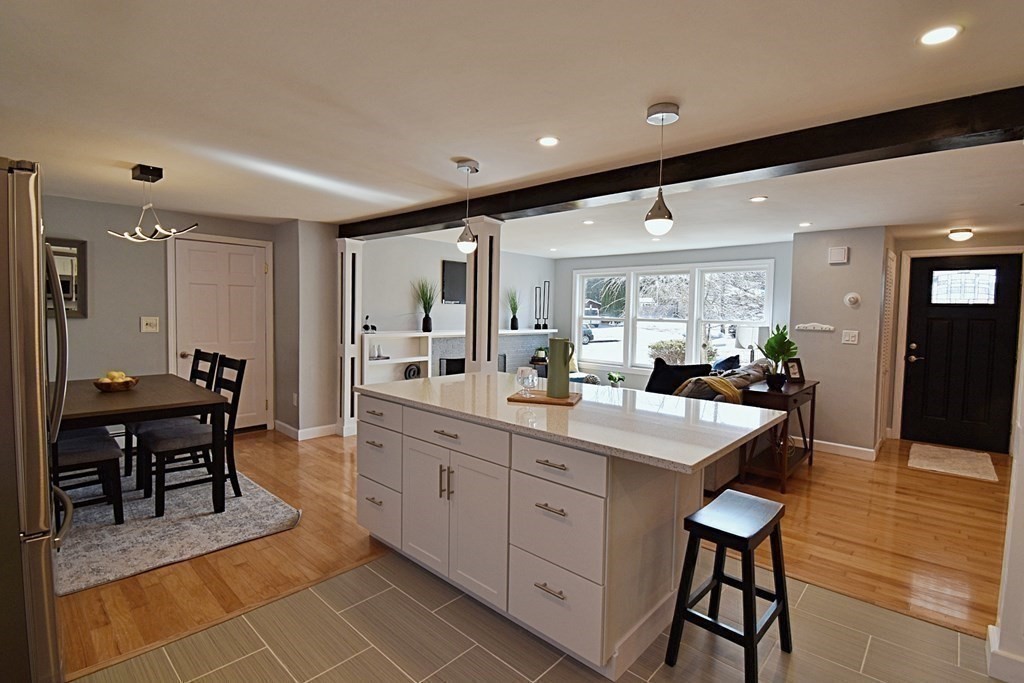 6 Appleton Road Natick, MA 01760 - Photo 8 of 42 a kitchen with cabinets table and chairs