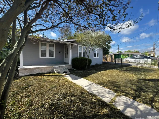 a front view of house with yard