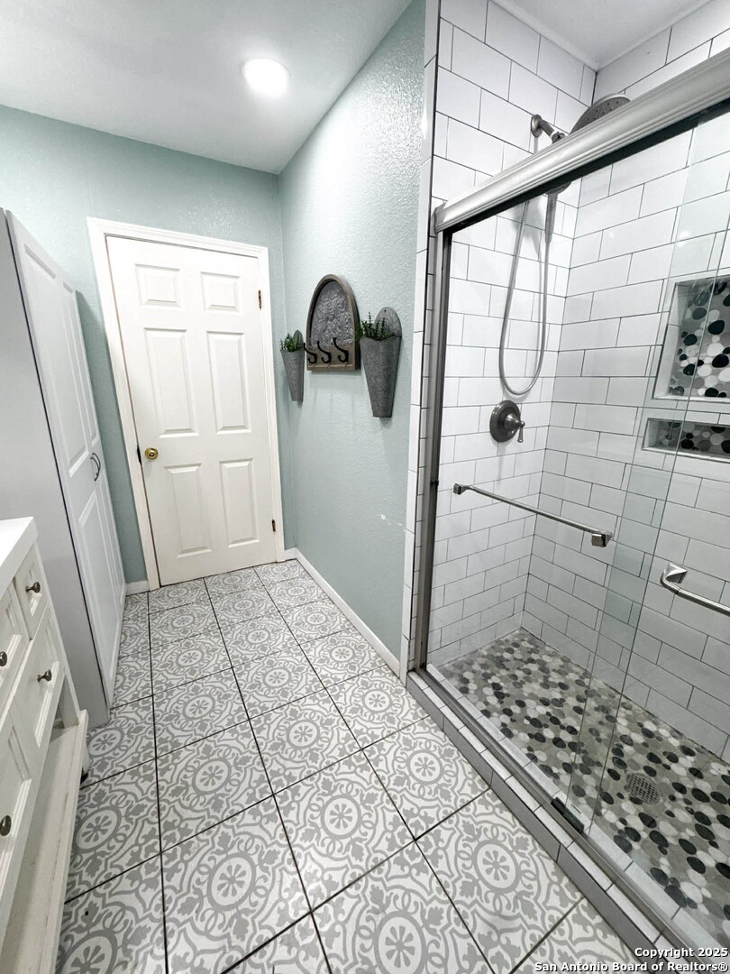520 West Pyron Avenue San Antonio, TX 78214 - Photo 11 of 19 a bathroom with a shower