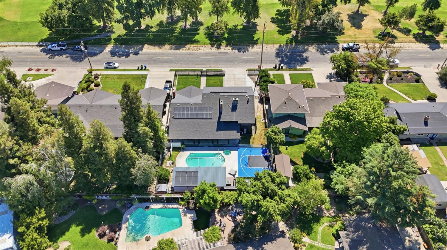 10401 Golf Link Road Turlock, CA 95380 - Photo 57 of 63 an aerial view of house with yard swimming pool and outdoor seating