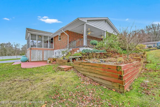 a view of a house with a big yard