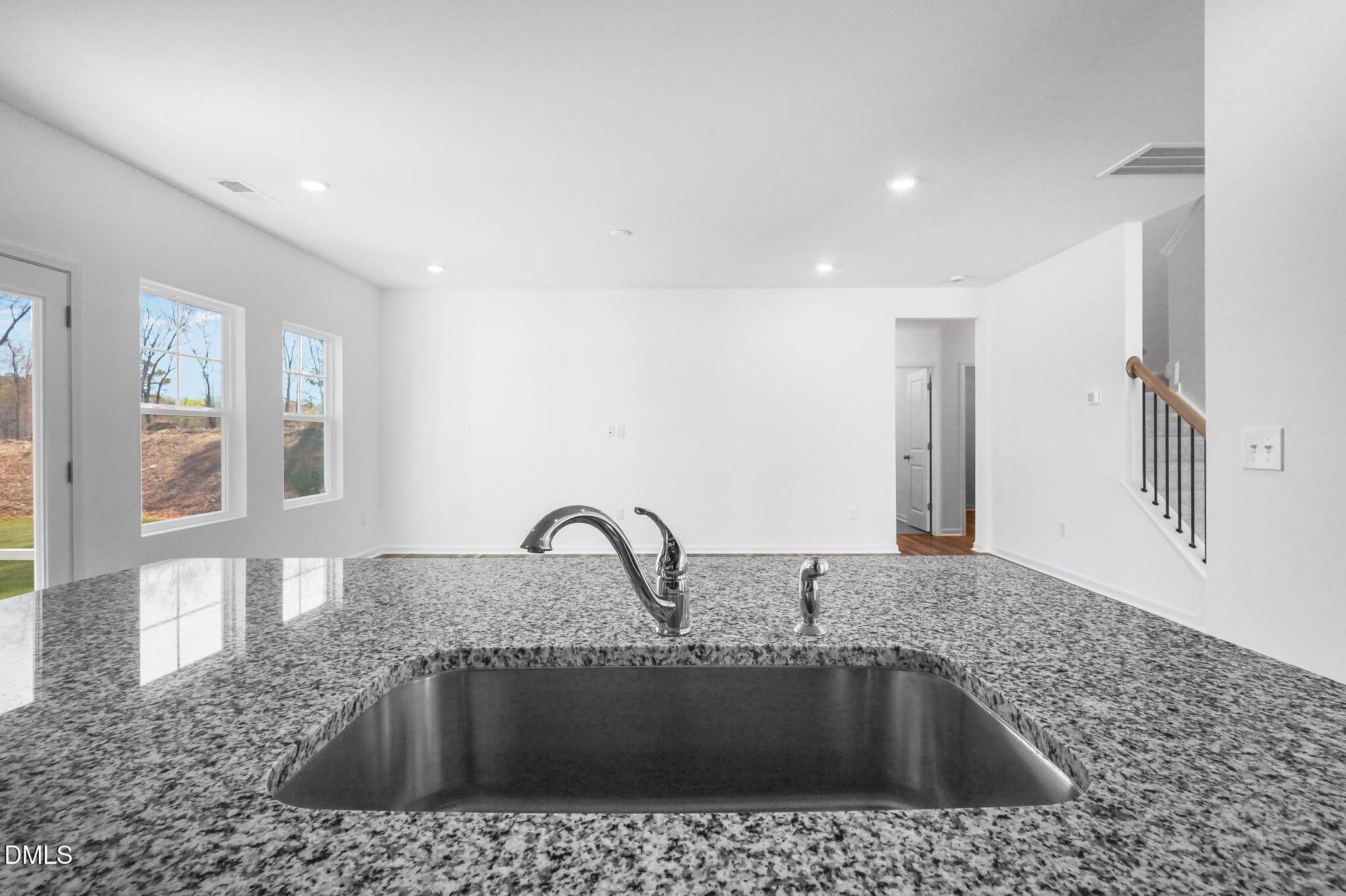 5818 Millstone Way Sims, NC 27880 - Photo 10 of 24 a kitchen with a sink and a window