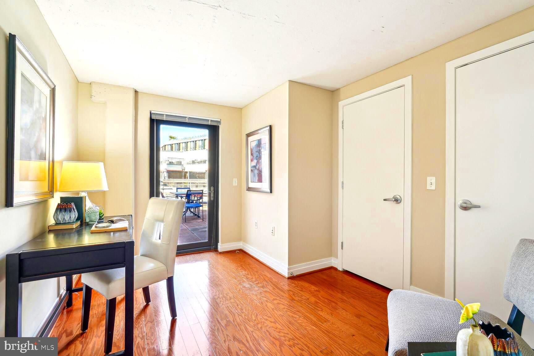 2120 Vermont Avenue Northwest, Unit 620 Washington, DC 20001 - Photo 17 of 69 a view of an livingroom with furniture and window