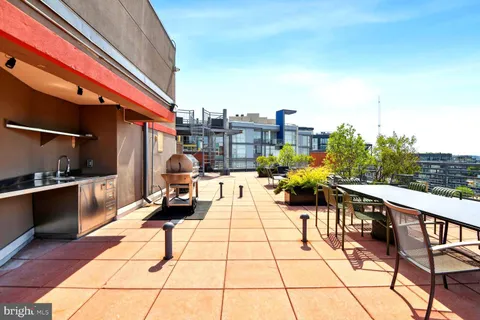 a view of a street with sitting area