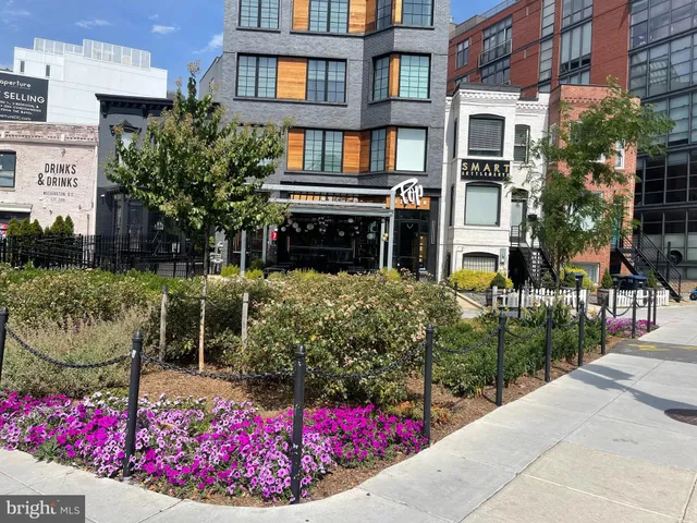 a front view of a building with outdoor area