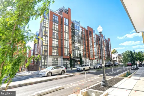 a view of city with tall buildings