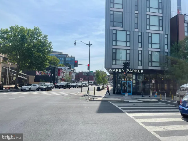 a view of a building with a street