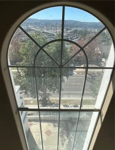 a kitchen with a stove a refrigerator and a stove top oven