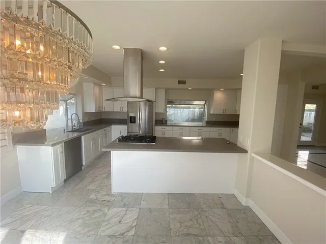a bathroom with a double vanity sink a and a mirror