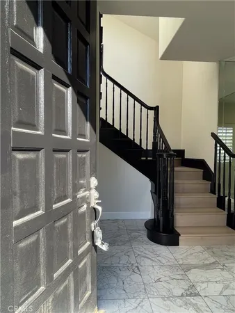 a view of a hallway with entryway