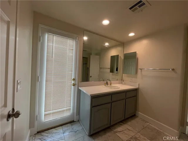 a view of empty room with windows