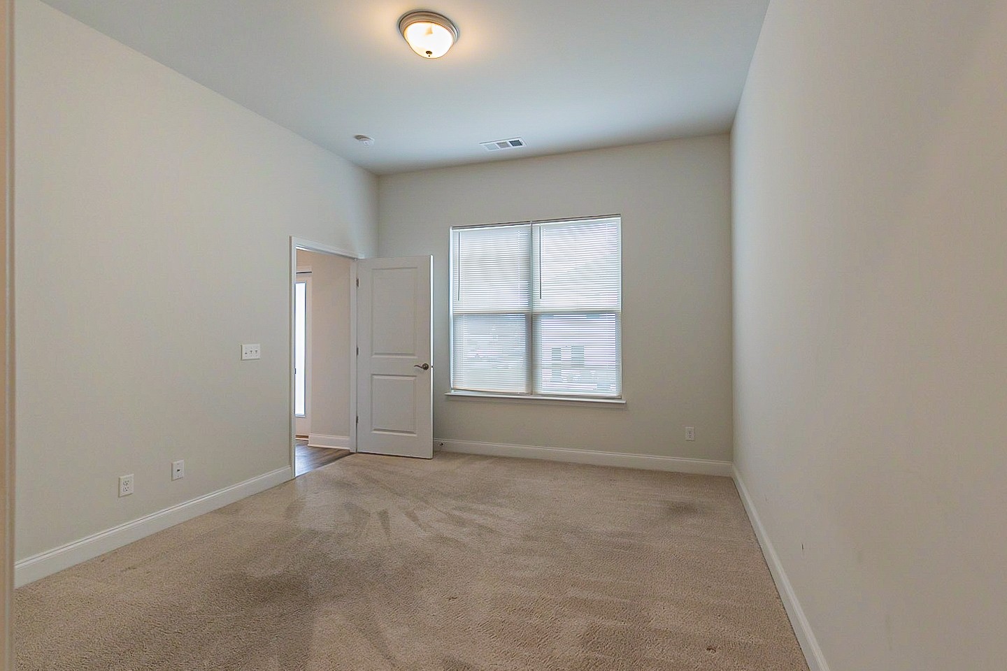 1001 Lonergan Circle Spring Hill, TN 37174 - Photo 14 of 38 an empty room with a window
