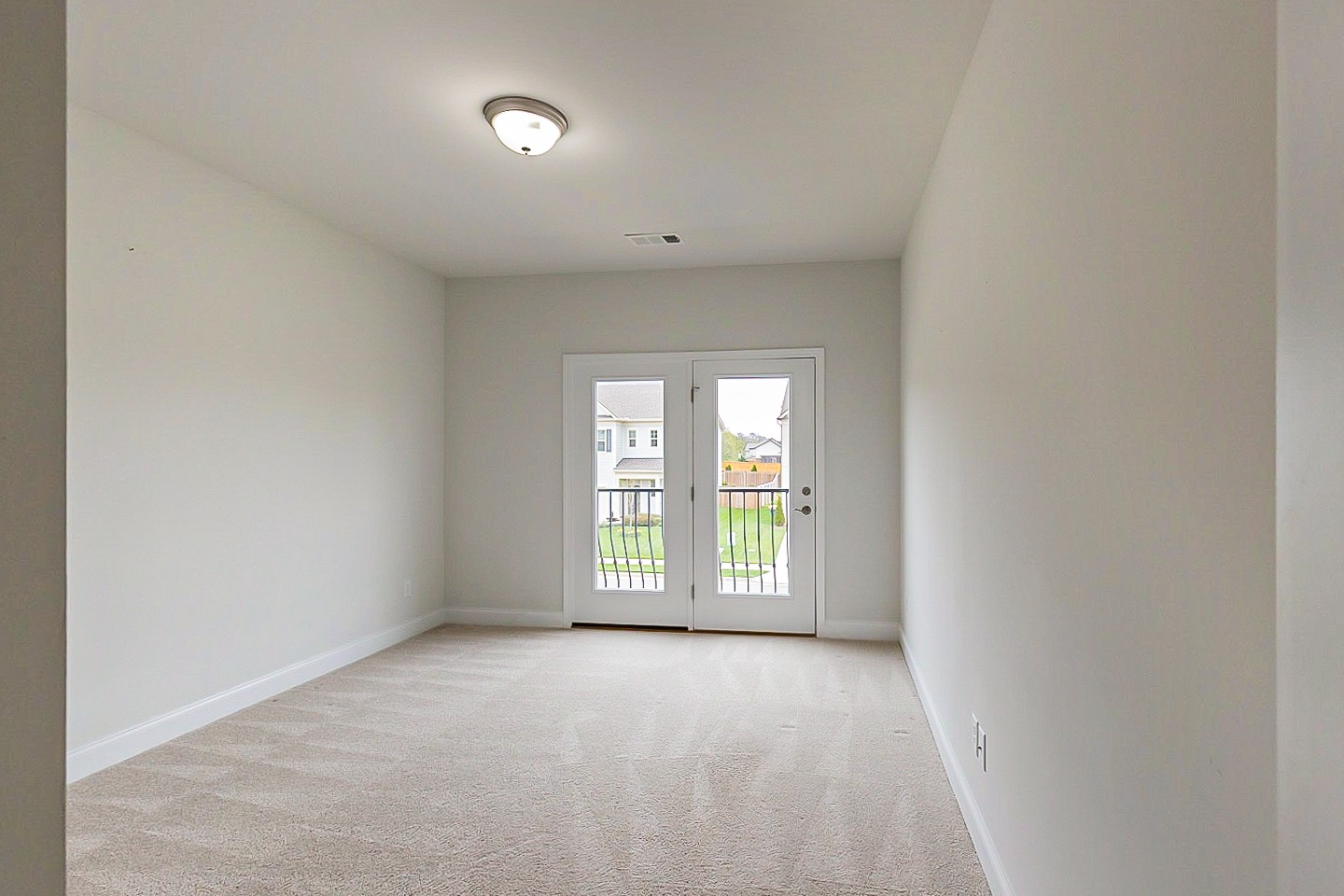 1001 Lonergan Circle Spring Hill, TN 37174 - Photo 15 of 38 an empty room with windows
