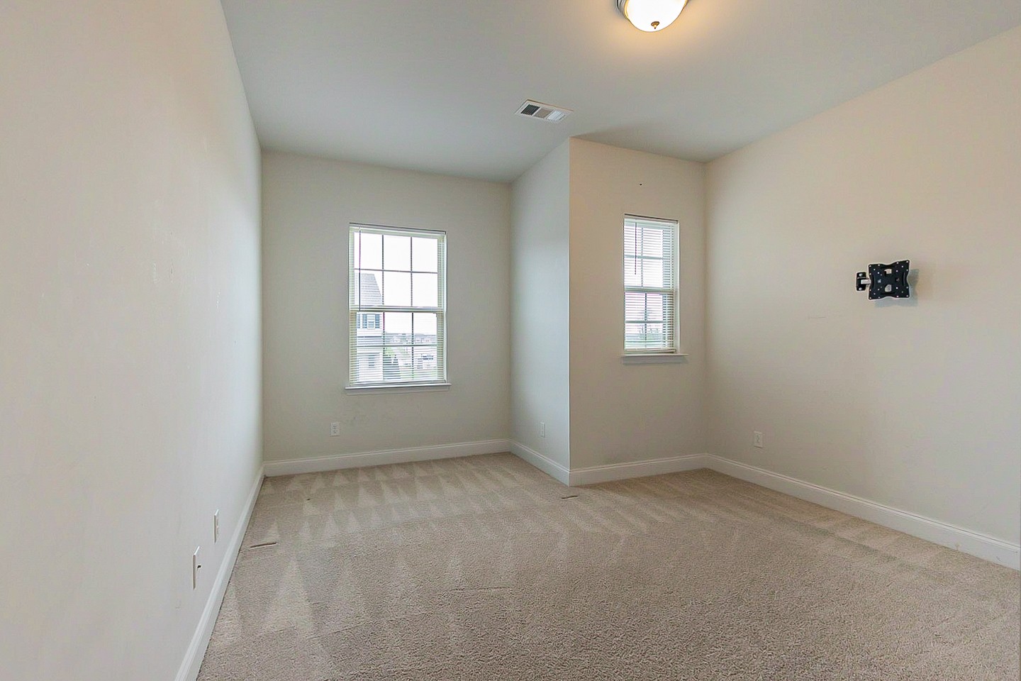 1001 Lonergan Circle Spring Hill, TN 37174 - Photo 18 of 38 an empty room with windows