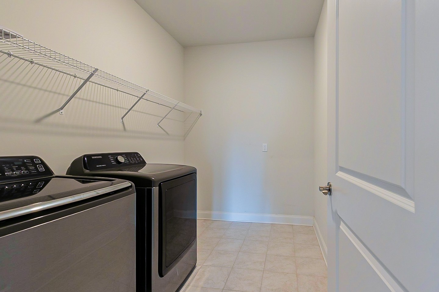 1001 Lonergan Circle Spring Hill, TN 37174 - Photo 28 of 38 a utility room with dryer and washer