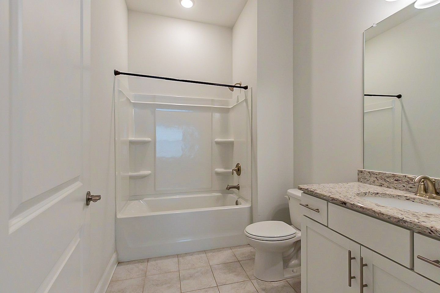 1001 Lonergan Circle Spring Hill, TN 37174 - Photo 34 of 38 a bathroom with a sink toilet and shower