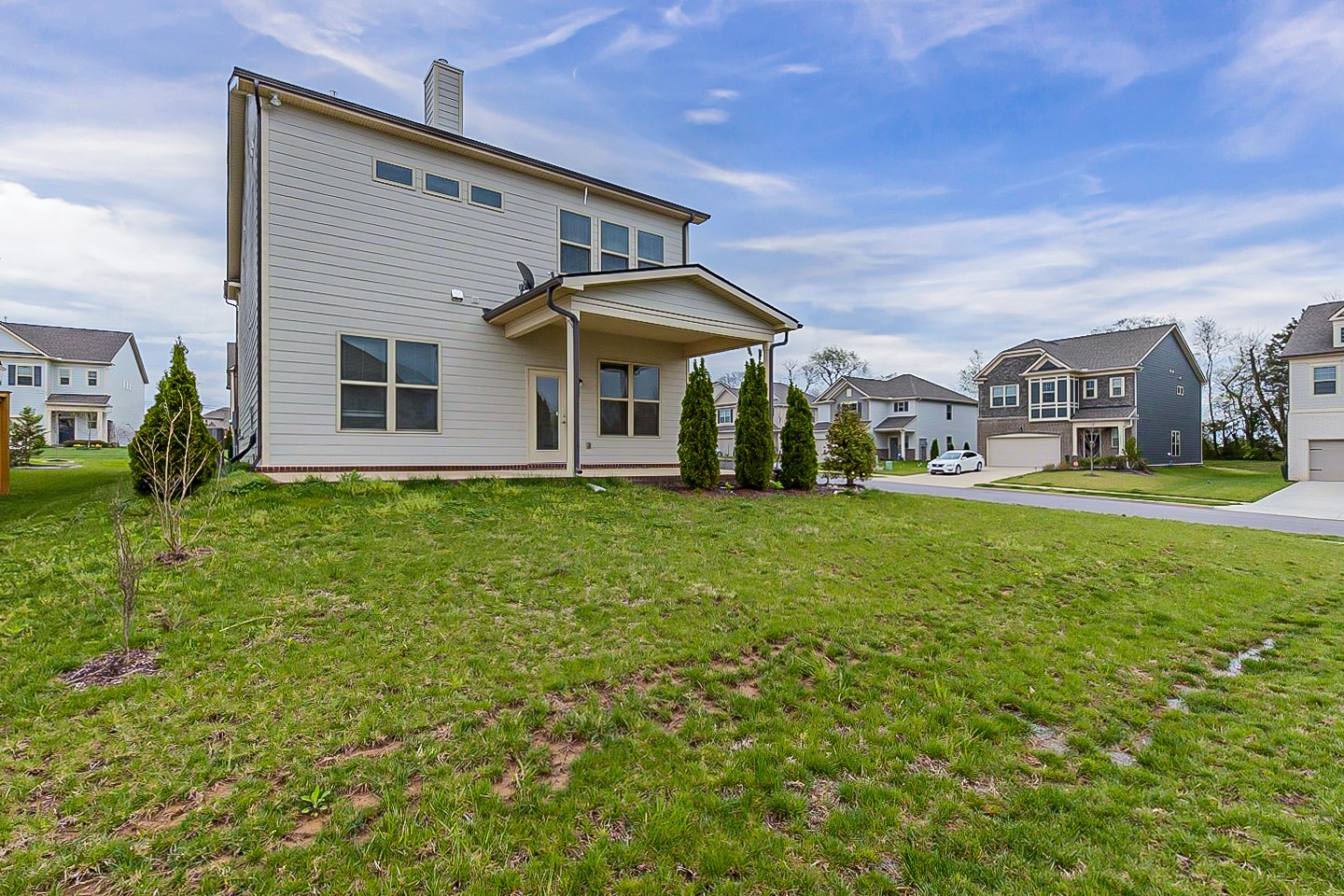 1001 Lonergan Circle Spring Hill, TN 37174 - Photo 5 of 38 a front view of house with yard and outdoor seating