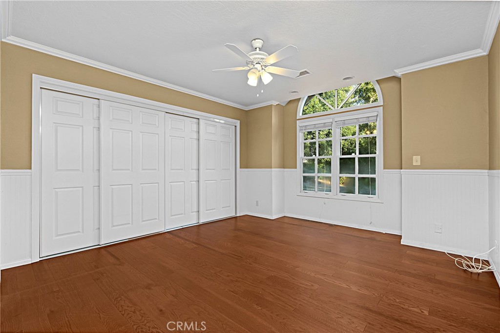 1011 Farrand Court Fallbrook, CA 92028 - Photo 32 of 49 a view of an empty room with a window and wooden floor