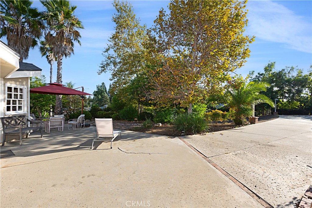 1011 Farrand Court Fallbrook, CA 92028 - Photo 34 of 49 a view of a backyard with a sitting area