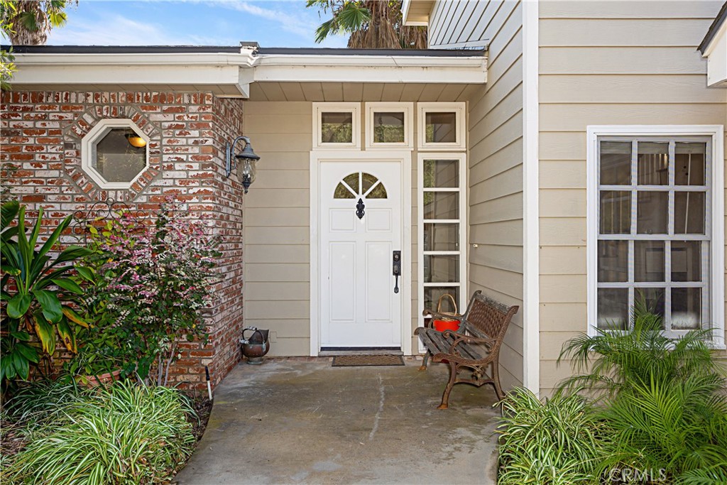 1011 Farrand Court Fallbrook, CA 92028 - Photo 4 of 49 a front view of a house with a garage