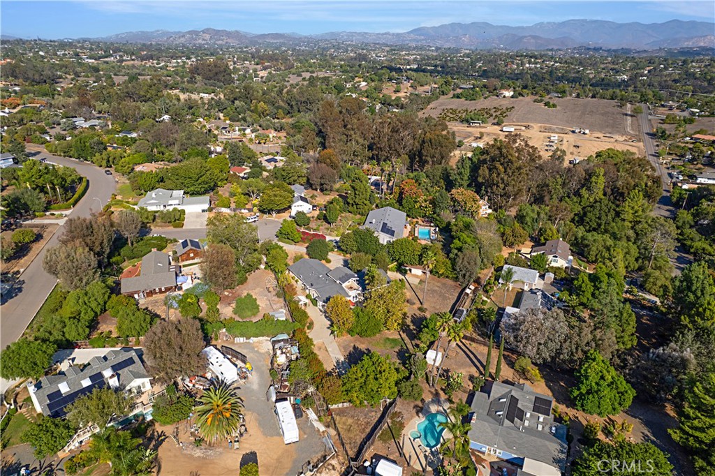 1011 Farrand Court Fallbrook, CA 92028 - Photo 43 of 49 an aerial view of residential houses with outdoor space and trees