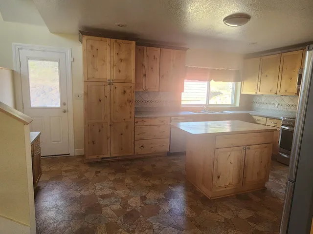 a bathroom with a sink and a shower