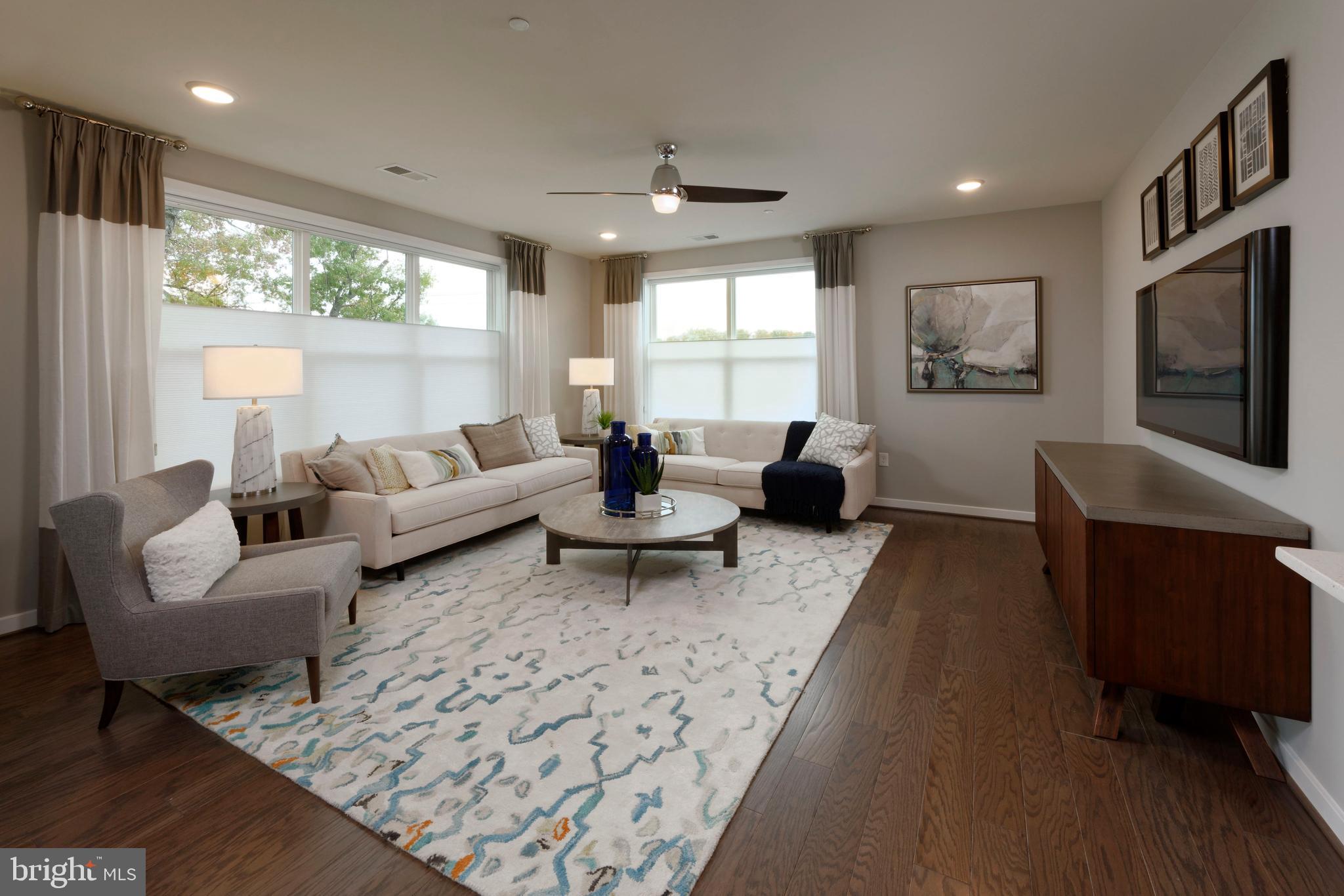 11200 Reston Station Boulevard, Unit 401 Reston, VA 20190 - Photo 1 of 6 Living Room - Illustrative purposes only