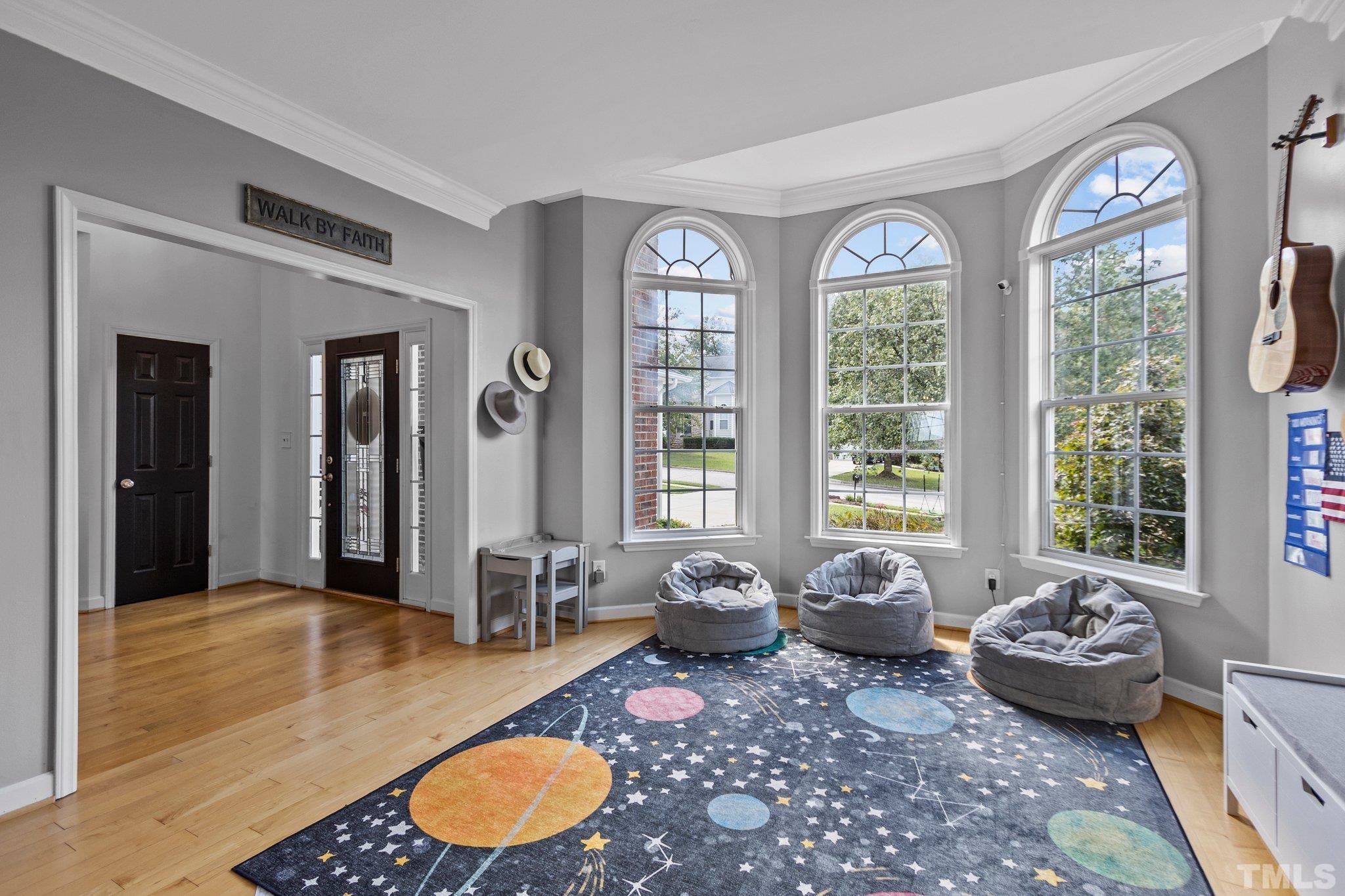 618 Seastone Street Raleigh, NC 27603 - Photo 10 of 51 a living room with furniture and window