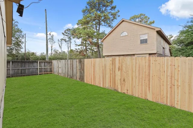 a view of a backyard with a garden