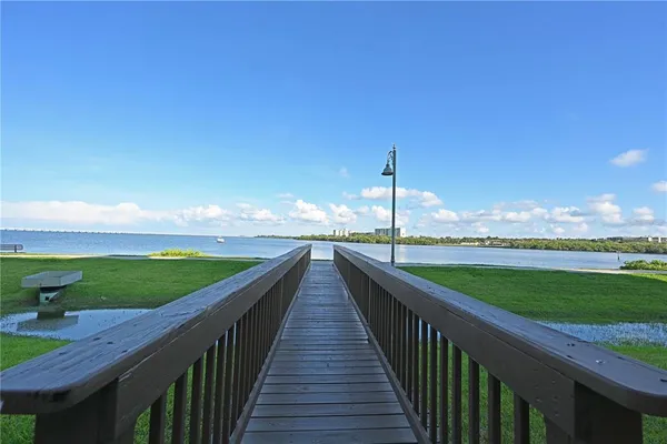 a view of a lake with a big yard