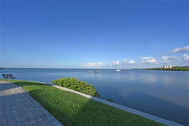 a view of balcony with wooden floor