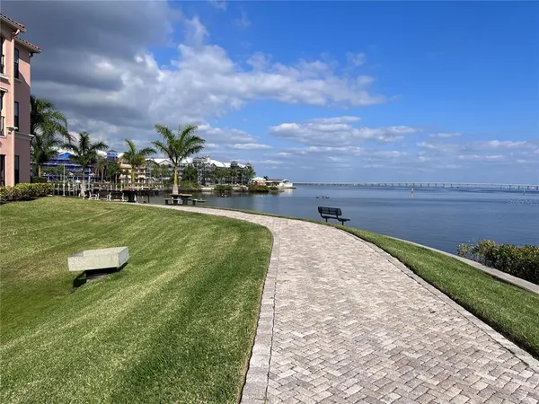 a view of a lake with a big yard