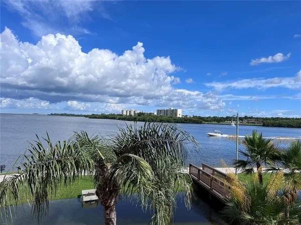 a view of a dining room that has a table and chairs