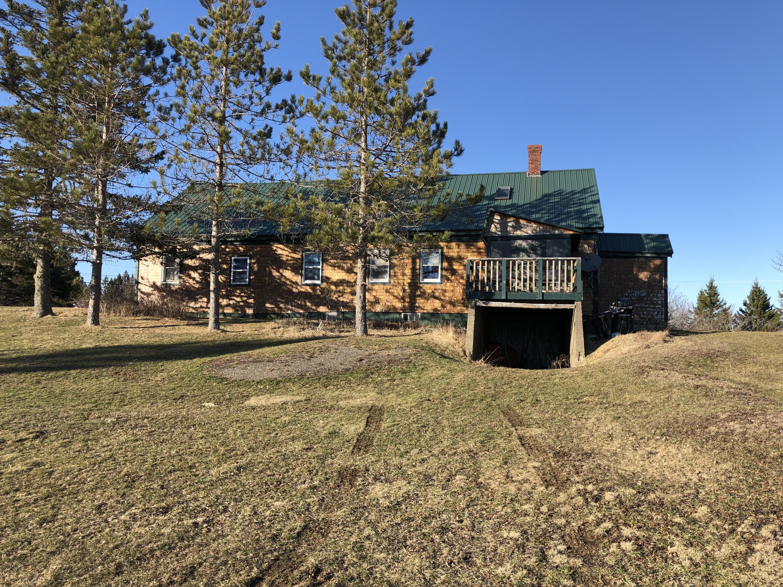 660 County Road Lubec, ME 04652 - Photo 2 of 45 3. Back side of house