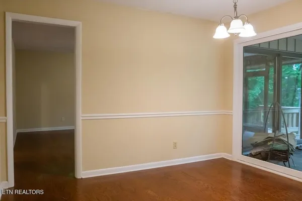 a view of a room with a large window