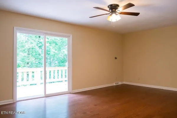 a bathroom with a shower and a toilet