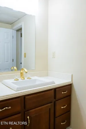 an empty room with wooden floor