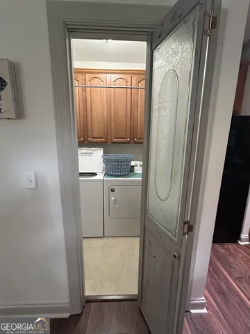 a bathroom with a shower and a sink