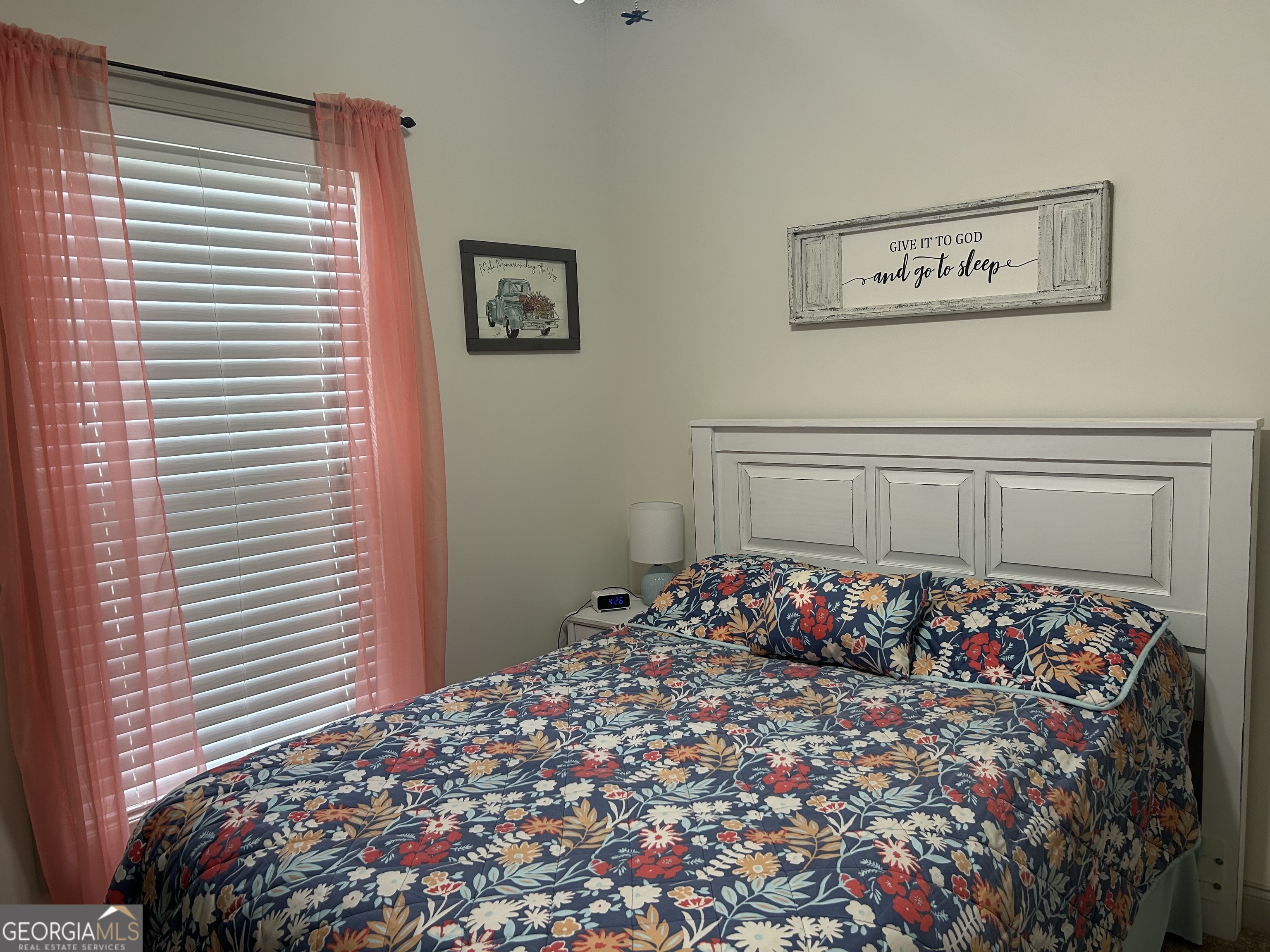 94 24th Avenue Eastman, GA 31023 - Photo 21 of 27 a bedroom with a bed and a window