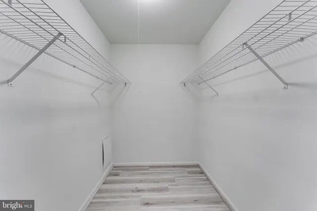 a view of a room with racks on the wall