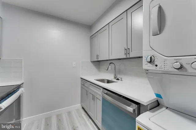 a view of bathroom with a sink and a toilet