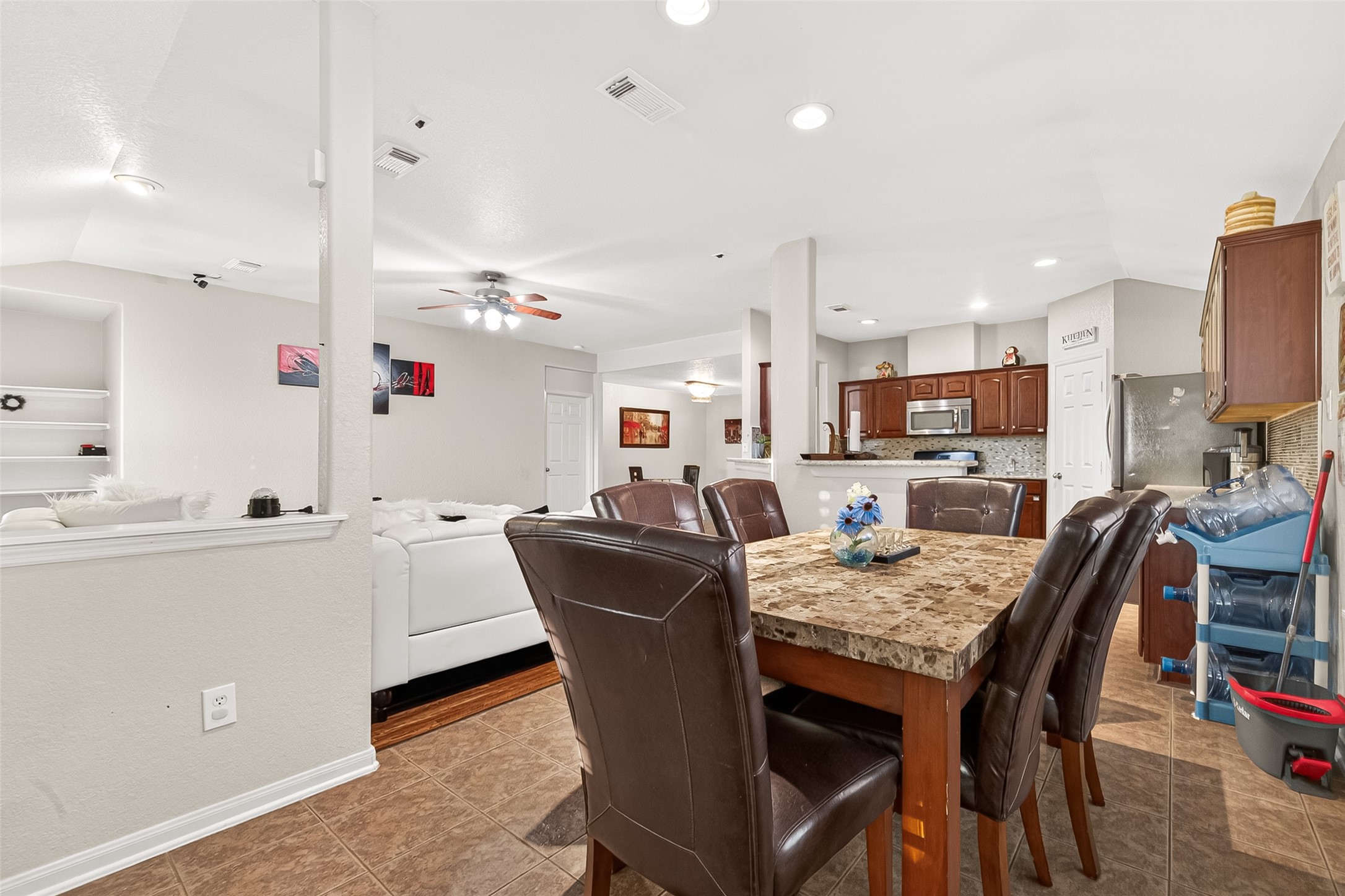 16715 Mackenzie Mesa Drive Spring, TX 77379 - Photo 19 of 50 a view of kitchen with dining table and chairs