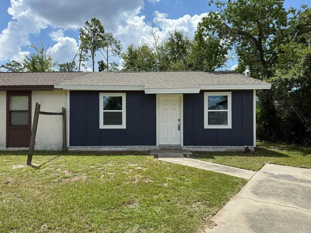 a view of outdoor space yard and garage