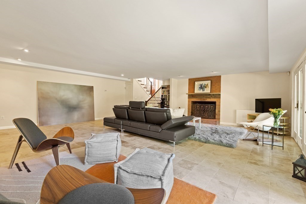 105 Georgetown Road Boxford, MA 01921 - Photo 24 of 42 a living room with furniture and a fireplace