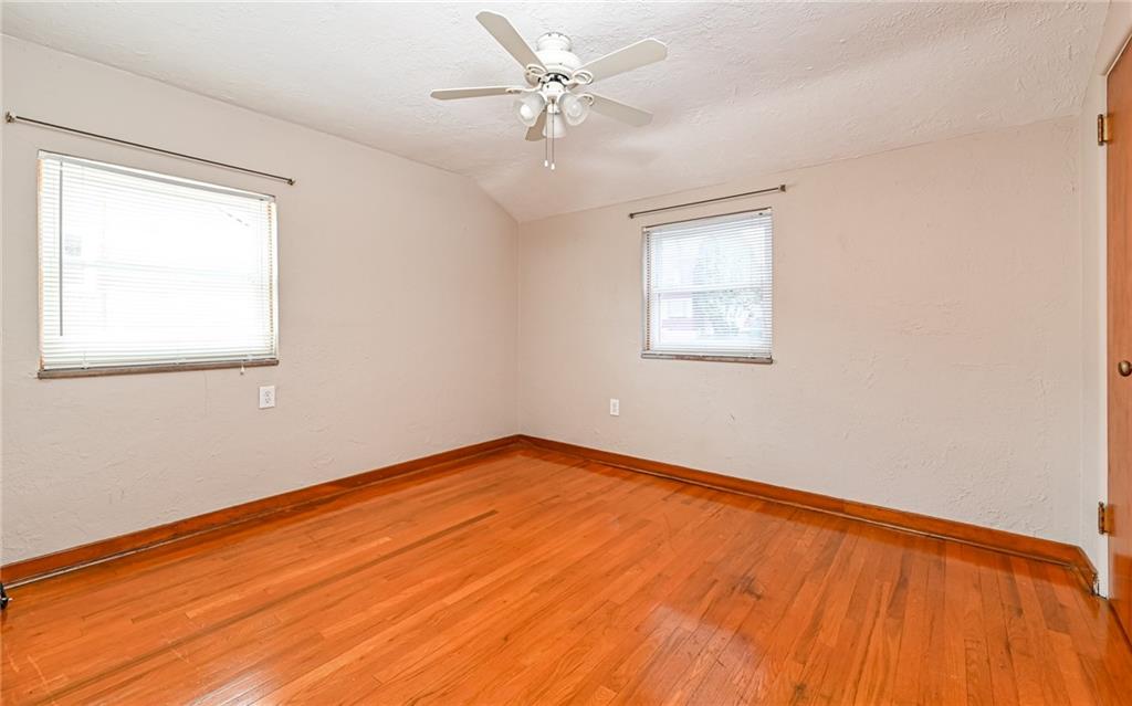 2349 Rose Garden Road Pittsburgh, PA 15220 - Photo 12 of 22 Primary bedroom will easily fit a queen sized bed and has ample closet space.