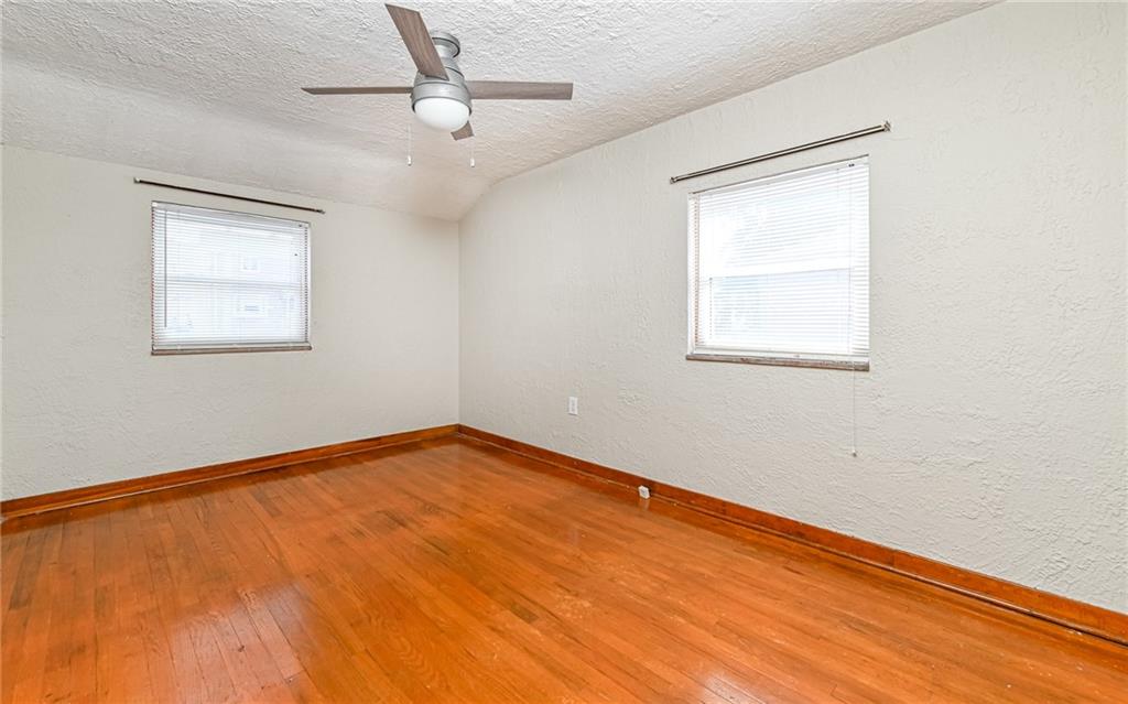 2349 Rose Garden Road Pittsburgh, PA 15220 - Photo 13 of 22 Second bedroom. All bedrooms are equipped with ceiling fans with overhead lighting.