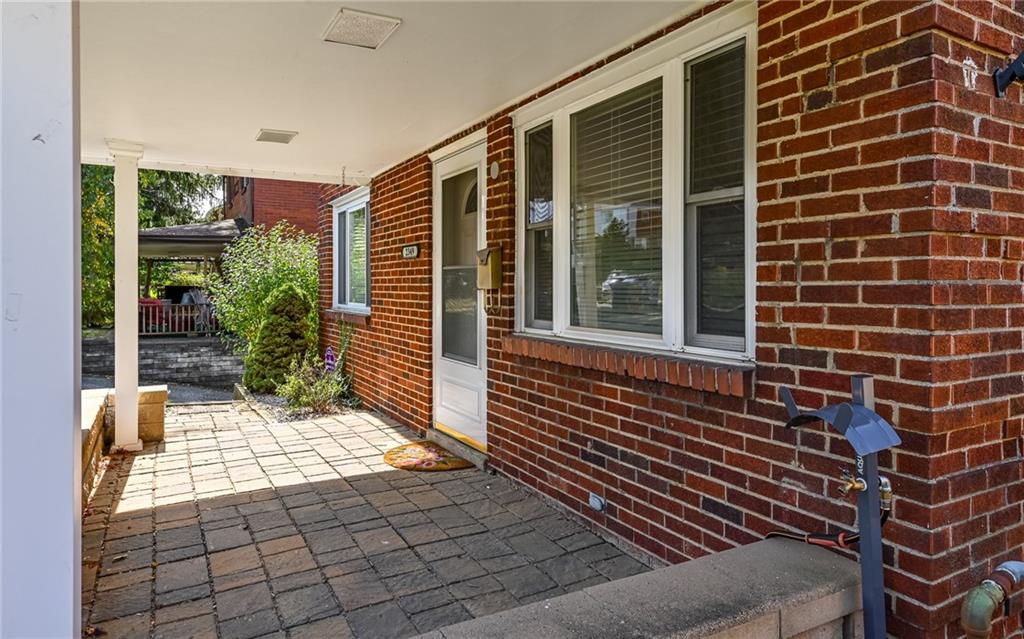 2349 Rose Garden Road Pittsburgh, PA 15220 - Photo 2 of 22 Cozy newer covered front porch, just right for sitting and enjoying the day.