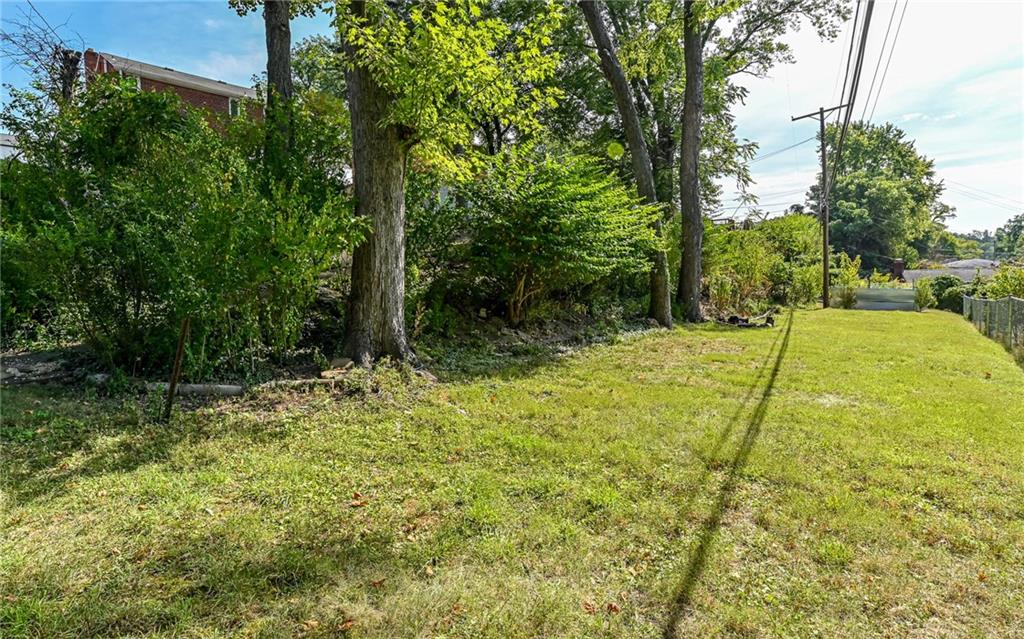 2349 Rose Garden Road Pittsburgh, PA 15220 - Photo 21 of 22 Lower level yard behind the back yard is common space owned by township. Current owner has been maintaining and utilizing this space.