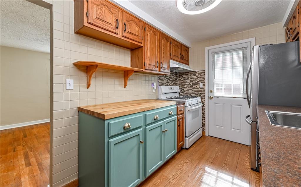 2349 Rose Garden Road Pittsburgh, PA 15220 - Photo 8 of 22 Fully equipped kitchen with gas stone, dishwasher, French door refrigerator and disposal.