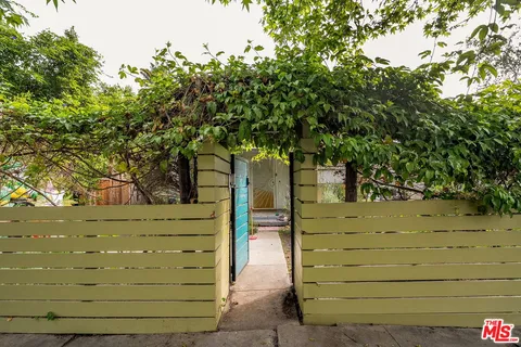 a view of a wooden fence